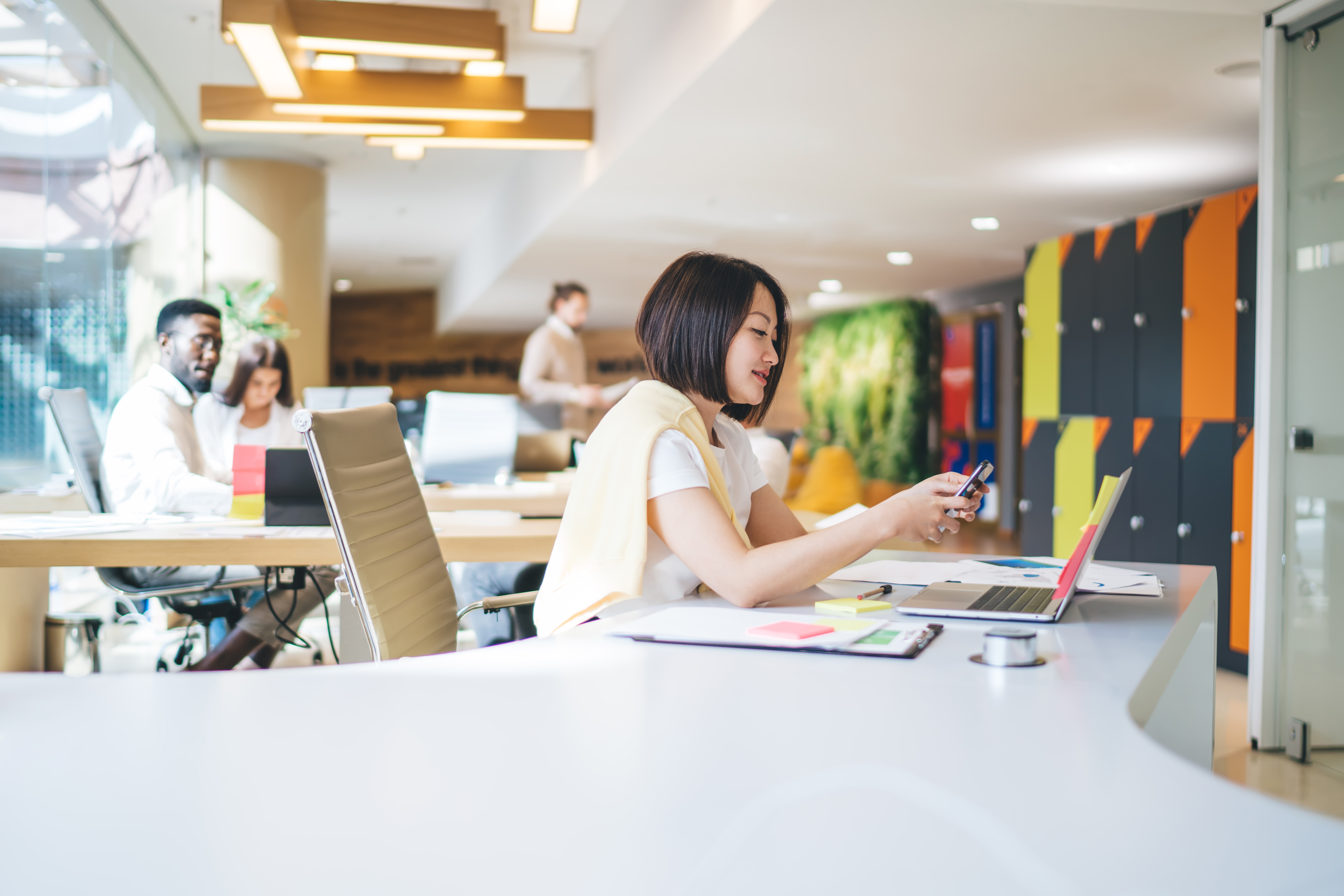 A sales intern at her office desk