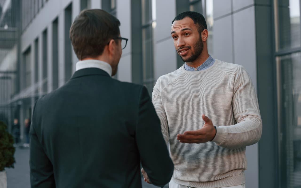 A sales representative upselling to a customer